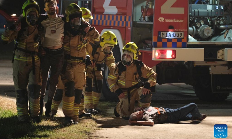 This photo taken on Nov. 8, 2022 shows the scene of an aircraft emergency exercise at the Malta International Airport in Luqa, Malta. Firefighters, medical crews and other responders got themselves busy on Tuesday night as they responded to an aircraft emergency exercise designed to test preparedness levels in case of a real-life emergency at the Malta International Airport.(Photo: Xinhua)