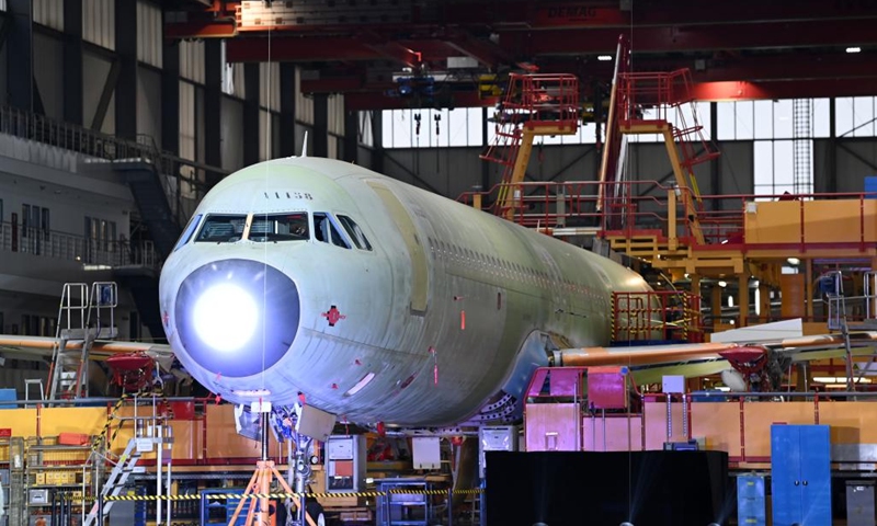 The first Airbus A321 aircraft is produced at the Final Assembly Line Asia (FALA) facility in north China's Tianjin on Nov. 9, 2022. European aircraft manufacturer Airbus started to produce A321 aircraft at its FALA facility in Tianjin on Wednesday -- confirmation that China is capable of delivering all models of Airbus' A320 family aircraft.(Photo: Xinhua)