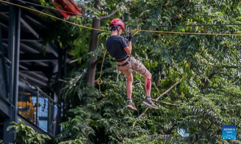 A mock victim is moved by rescuers during the nationwide simultaneous earthquake drill in San Juan City, the Philippines, Nov. 10, 2022. The earthquake drill was held to enhance disaster preparedness of the authorities and the public.(Photo: Xinhua)