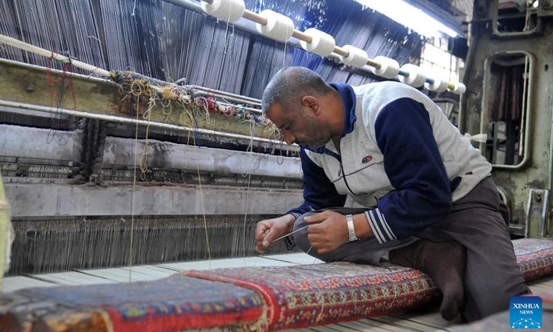 A man weaves carpets at a workshop in Damascus, Syria, on Nov. 10, 2022.(Photo: Xinhua)