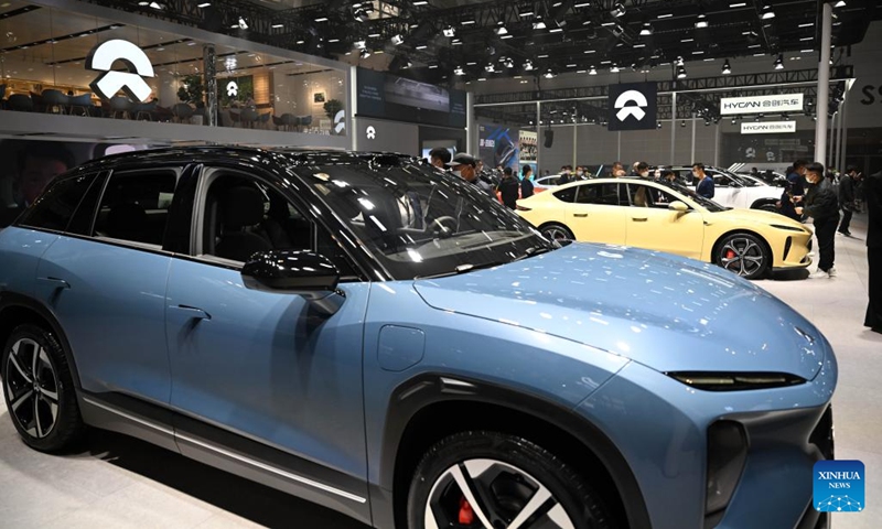 People visit the booth of Chinese electric automaker NIO during the China Motor Show (Tianjin) 2022 in north China's Tianjin, Nov. 10, 2022. China Motor Show (Tianjin) 2022, or Auto Tianjin 2022 kicked off on Thursday in the north Chinese port city of Tianjin.(Photo: Xinhua)