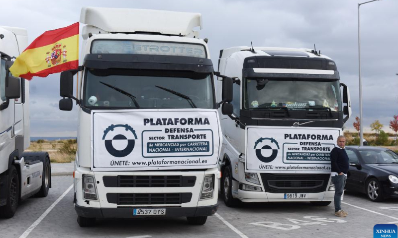 Trucks are seen during a protest in Madrid, Spain, on Nov. 14, 2022. Truck drivers in Spain began an indefinite strike on Monday against the rising cost of living. Back in March and April, the country's truckers staged a 20-day strike, which caused major problems in the national supply chains. Photo: Xinhua