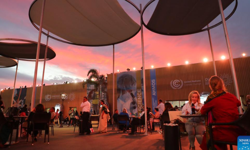 Participants enjoy the sunset at the venue of the 27th session of the Conference of the Parties (COP27) to the United Nations Framework Convention on Climate Change, in Sharm El-Sheikh, Egypt, Nov. 14, 2022. Photo: Xinhua
