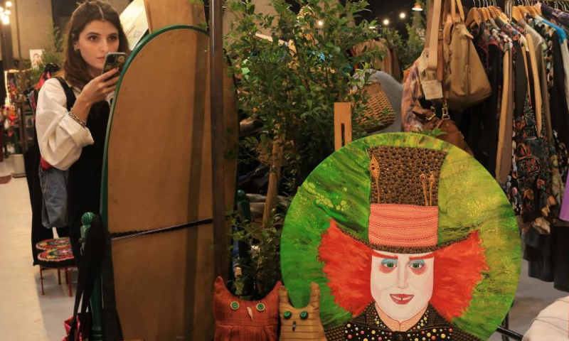 A woman visits a flea market in Beirut, Lebanon, Dec. 10, 2022. (Xinhua/Liu Zongya)