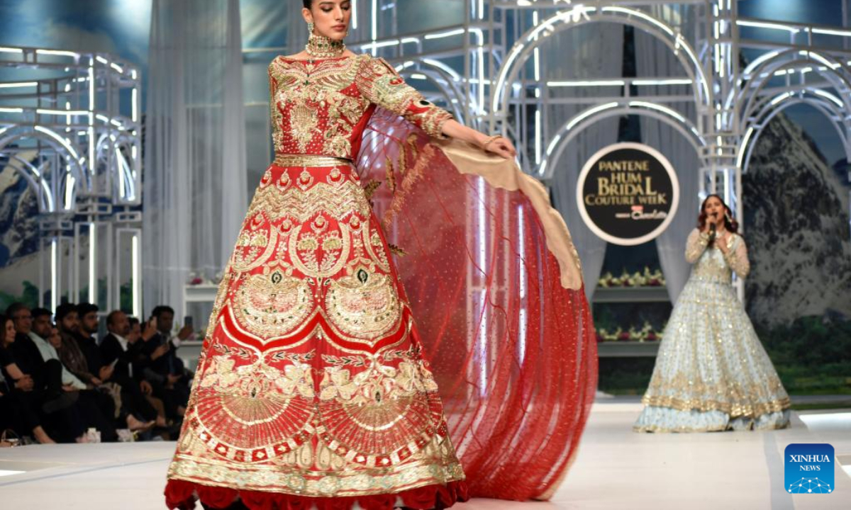 Models present creations during the Bridal Couture Week in Lahore, Pakistan on Dec 16, 2022. Photo:Xinhua