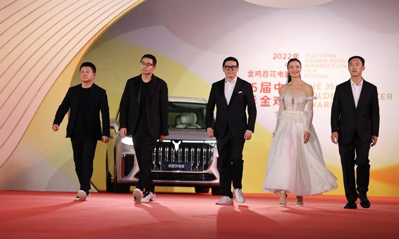 Cast of the film Nice View attend the red carpet ceremony of the 2022 China Golden Rooster and Hundred Flowers Film Festival in Xiamen, southeast China's Fujian Province, Nov. 12, 2022.

The red carpet ceremony of the 2022 China Golden Rooster and Hundred Flowers Film Festival, featuring the 35th China Golden Rooster Awards, was held here on Saturday. (Photo by Zeng Demeng/Xinhua)