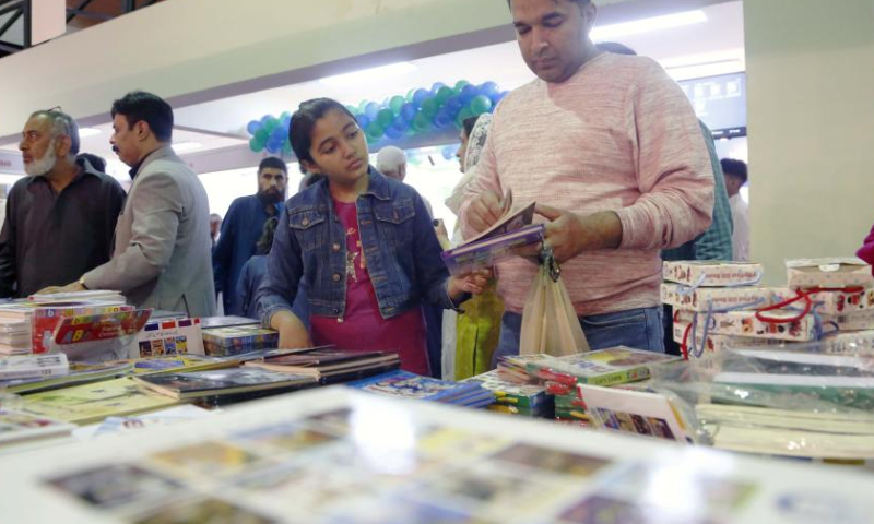 People visit a stall at the Karachi International Book Fair in Karachi, Pakistan on Dec. 11, 2022.

Over 300 bookstalls have been set up in the book fair, which will conclude on Monday. (Xinhua/Ahmad Kamal)