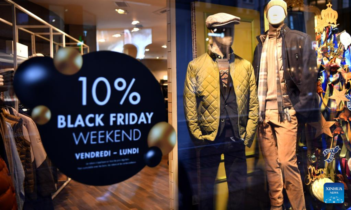 A sales promotion sign is seen during Black Friday sales at a shop in Geneva, Switzerland, Nov 25, 2022. Photo:Xinhua