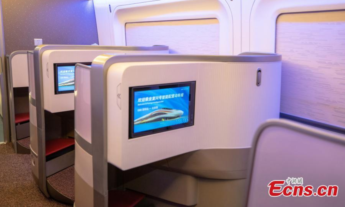 Photo shows the interior view of business class on a Fuxing bullet train in Guangzhou, south China's Guangdong Province, Dec 26, 2022. Photo:China News Service