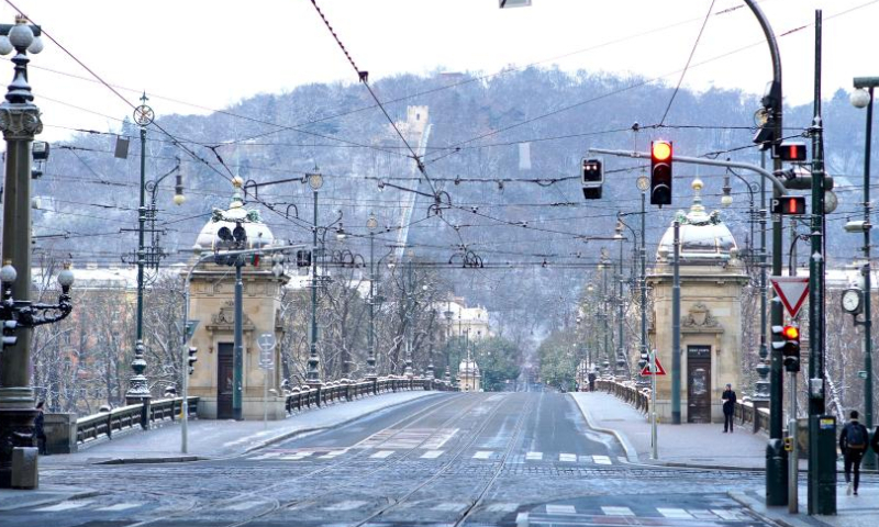 This photo shows the snow-covered Legion Bridge in Prague, the Czech Republic, Nov. 19, 2022. (Photo by Dana Kesnerova/Xinhua)