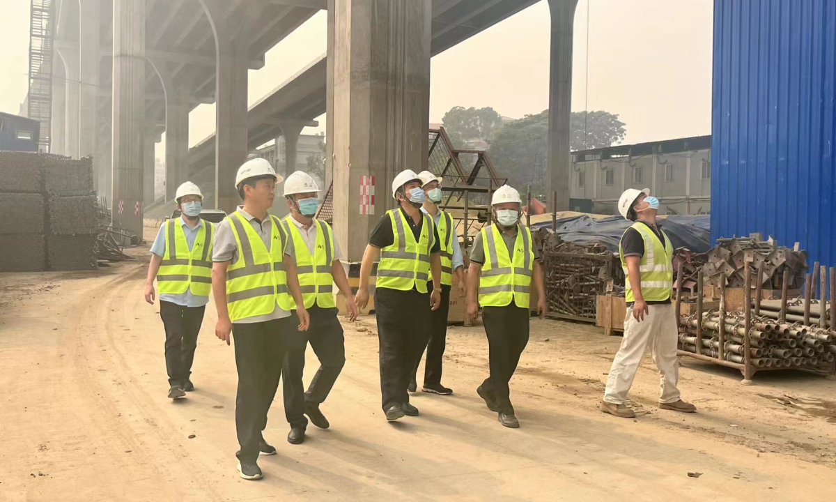 Zhu Xiaofan (second right) and his colleagues at a construction site in Bangladesh Photo: Courtesy of Zhu