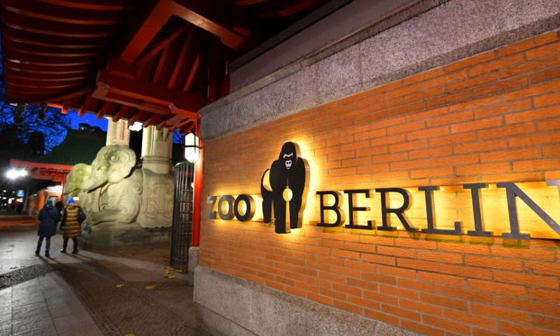 People walk past Zoo Berlin in Berlin, Germany, Nov. 18, 2022. Zoo Berlin has been temporarily closed since Friday due to bird flu, according to media reports. (Xinhua/Ren Pengfei)