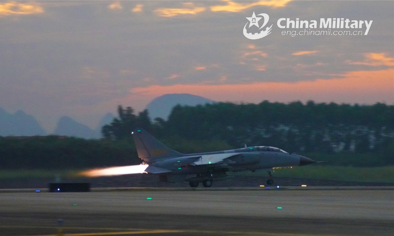 A JH-7 fighter bomber attached to an aviation brigade under the PLA Southern Theater Command takes off in full speed during a round-the-clock flight training exercise on October 21, 2022. Photo: eng.chinamil.com.cn