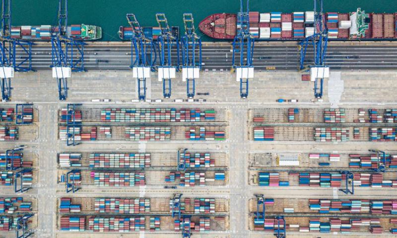 This aerial photo taken on Nov. 5, 2022 shows a view of the Yangpu international container terminal in the Yangpu Economic Development Zone, south China's Hainan Province. According to Haikou Customs statistics, in the first 11 months of 2022, the total import and export value of Hainan's goods trade was 182.63 billion yuan (about 26.25 billion U.S. dollars), an increase of 40.1% year-on-year. (Xinhua/Pu Xiaoxu)
