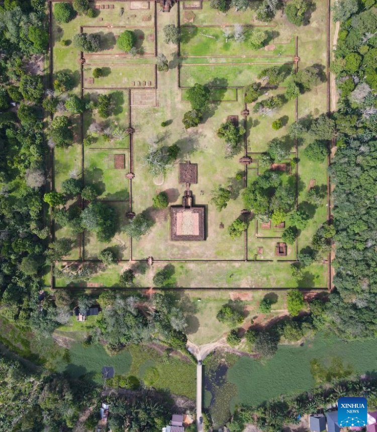 This aerial photo taken on Dec. 1, 2022 shows ruins of Kedaton Temple in Muarajambi Temple Complex in Maro Sebo, Jambi, Indonesia.

Muarajambi Temple Complex is a complex of several temples located in Maro Sebo, in the province of Jambi. In this area of about 3,000 hectares, there are around 11 Buddhist temples and about 80 mounds of earth which are thought to also have ancient building structures inside. (Xinhua/Xu Qin)
