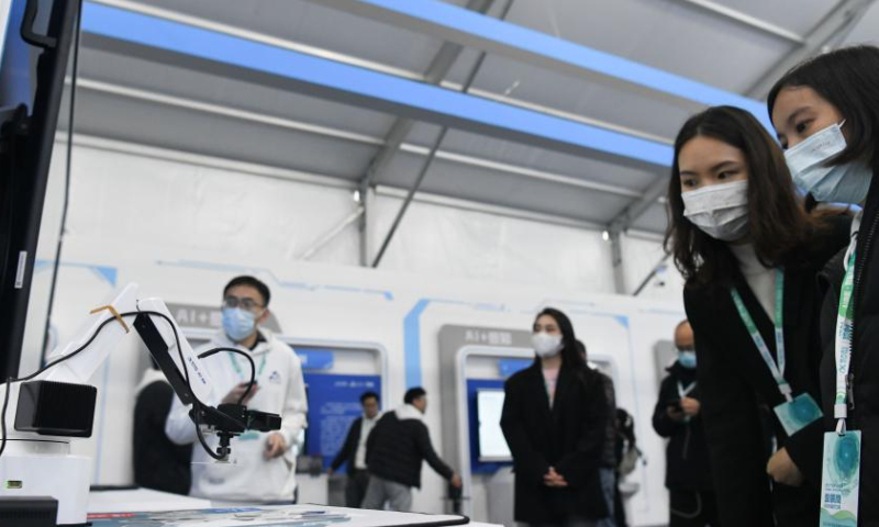 Visitors learn about a product based on AI image recognition technology at the 5th World Voice Expo in Hefei, east China's Anhui Province, Nov. 17, 2022. The 5th World Voice Expo and Global 1024 Developer Festival kicked off here on Thursday. Photo: Xinhua
