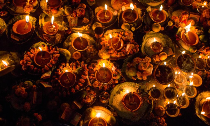 Oil lamps and the offerings are pictured during the Bala Chaturdashi Festival at the Pashupatinath Temple in Kathmandu, Nepal, Nov. 21, 2022. (Photo by Sulav Shrestha/Xinhua)