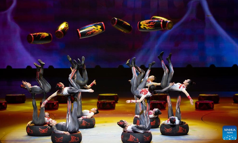 Artists perform during the 11th China Acrobatics Golden Chrysanthemum Awards Competition held in Puyang, central China's Henan Province, Nov. 9, 2022. This award is deemed the highest honor in China for acrobatics. (Xinhua/Xu Jiayi)