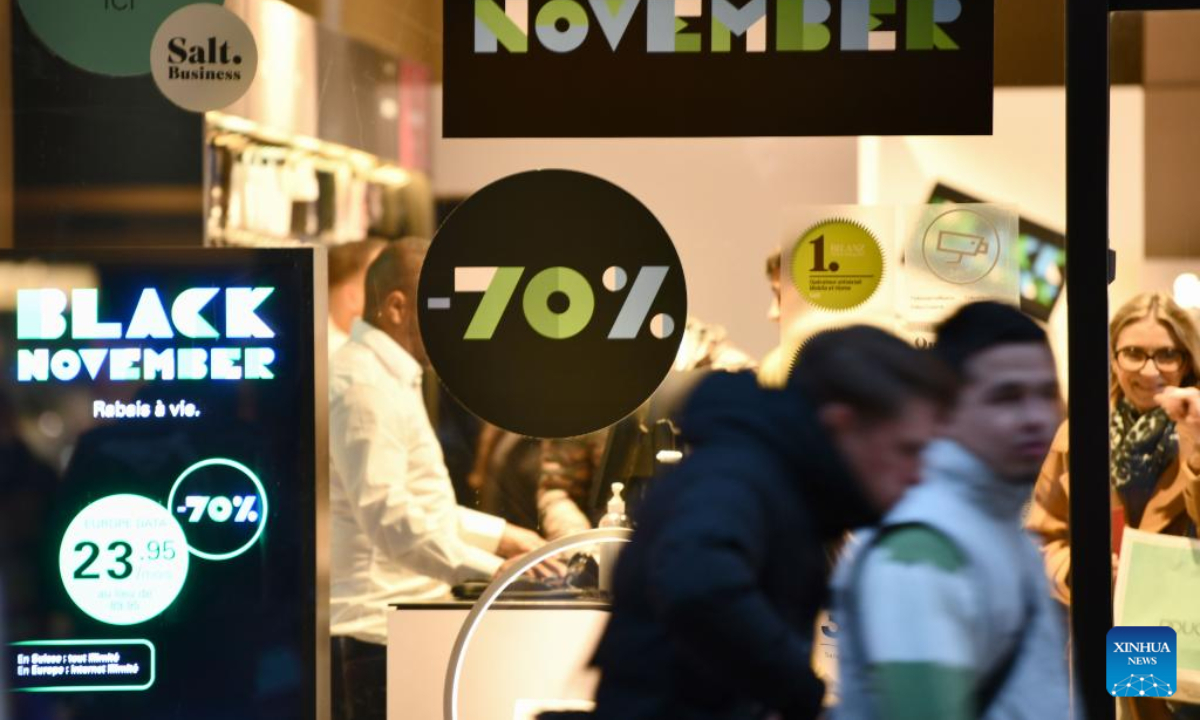 A sales promotion sign is seen during Black Friday sales at a shop in Geneva, Switzerland, Nov 25, 2022. Photo:Xinhua