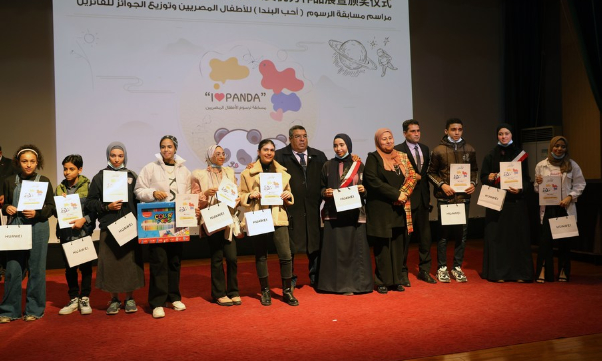 Prize winners pose for a group photo at the award ceremony of the 