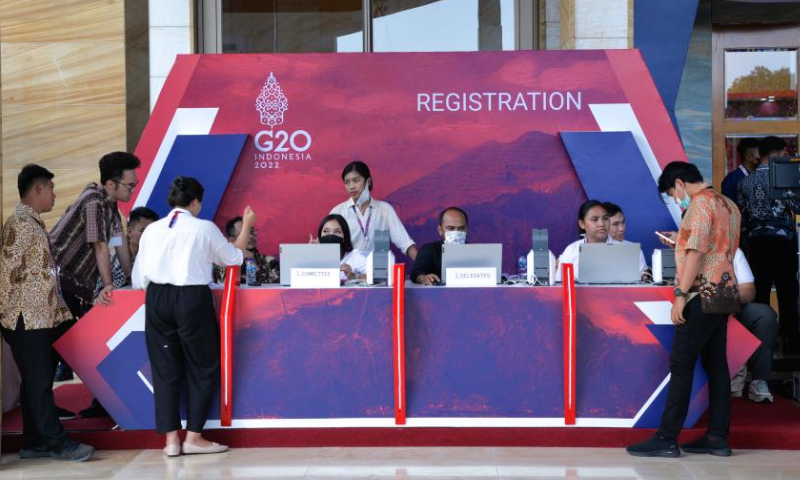 This photo taken on Nov. 11, 2022 shows staff members preparing for the upcoming 17th Group of 20 (G20) Summit outside a venue for the summit in Bali, Indonesia. Photo: Xinhua