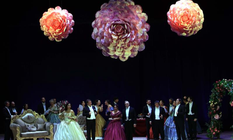 Artists perform in the opera La Traviata during the 2022 Amman Opera Festival in Amman, Jordan, on Nov. 18, 2022. (Photo by Mohammad Abu Ghosh/Xinhua)