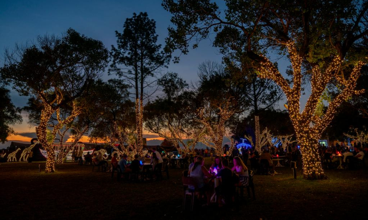 People visit a light fair in Potchefstroom, South Africa, Dec 22, 2022. Photo:Xinhua