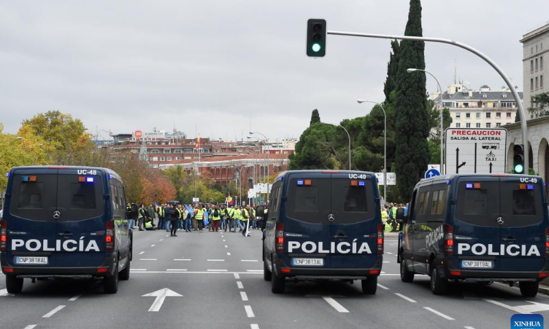 Truck drivers take part in a protest in Madrid, Spain, on Nov. 14, 2022. Truck drivers in Spain began an indefinite strike on Monday against the rising cost of living. Back in March and April, the country's truckers staged a 20-day strike, which caused major problems in the national supply chains. Photo: Xinhua