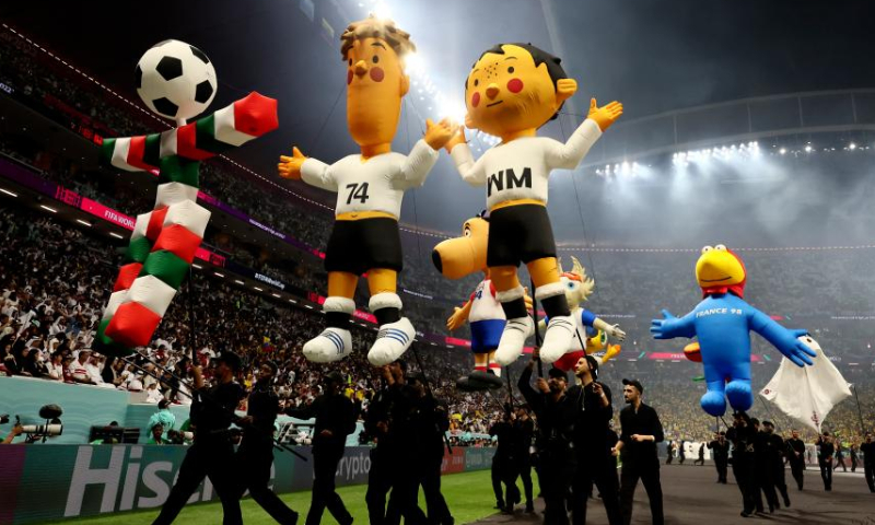 Mascots of previous World Cups are seen during the opening ceremony before the Group A match between Qatar and Ecuador at the 2022 FIFA World Cup at Al Bayt Stadium in Al Khor, Qatar, on Nov. 20, 2022. (Xinhua/Lan Hongguang)