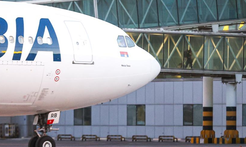 A passenger exits the flight JU702 at Tianjin Binhai International Airport in north China's Tianjin, Dec. 10, 2022. The flight carrying about 170 passengers landed at Tianjin Binhai International Airport on Saturday, marking the official opening of the direct flight between Serbia's Belgrade and north China's Tianjin city.

Flights operated by Serbia's national carrier Air Serbia, will run once a week. (Xinhua/Li Ran)
