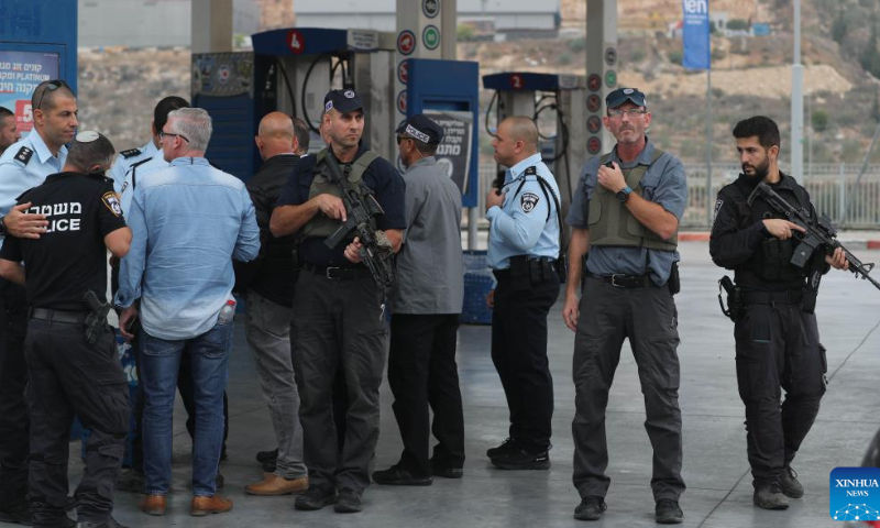 Security personnel are seen at the scene of an attack near the Israeli settlement of Ariel in the West Bank, on Nov. 15, 2022. A Palestinian man killed three Israelis and wounded three others in an attack on Tuesday in the West Bank before being shot dead by Israeli forces, Israeli military and medics said. Photo: Xinhua