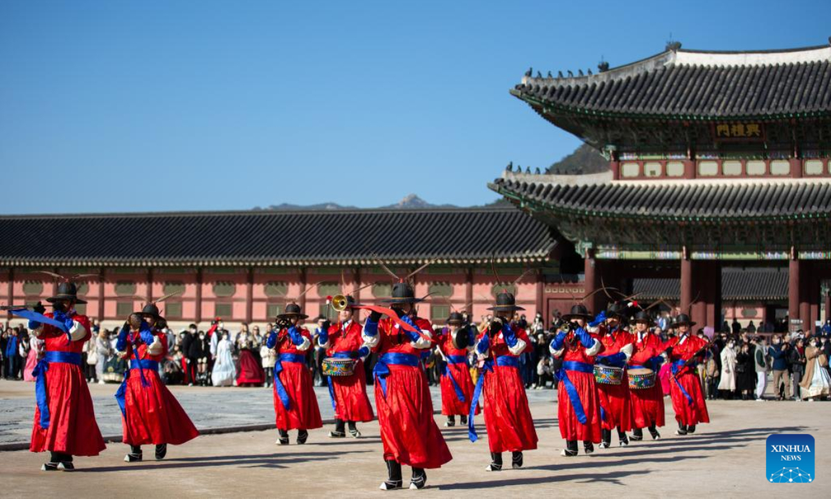 Staff members perform at the Gyeongbokgung Palace in Seoul, South Korea, Nov 26, 2022. Photo:Xinhua