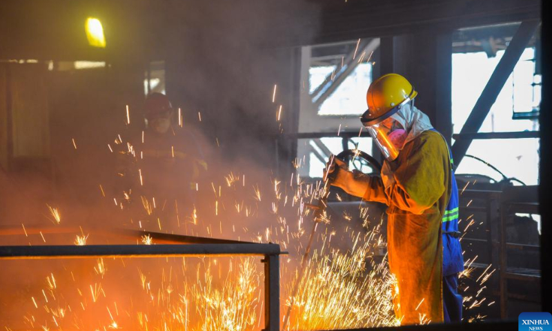 A worker works on a ferronickel production line in Weda Bay Industrial Park, North Maluku, Indonesia, Sept. 25, 2022. Photo: Xinhua