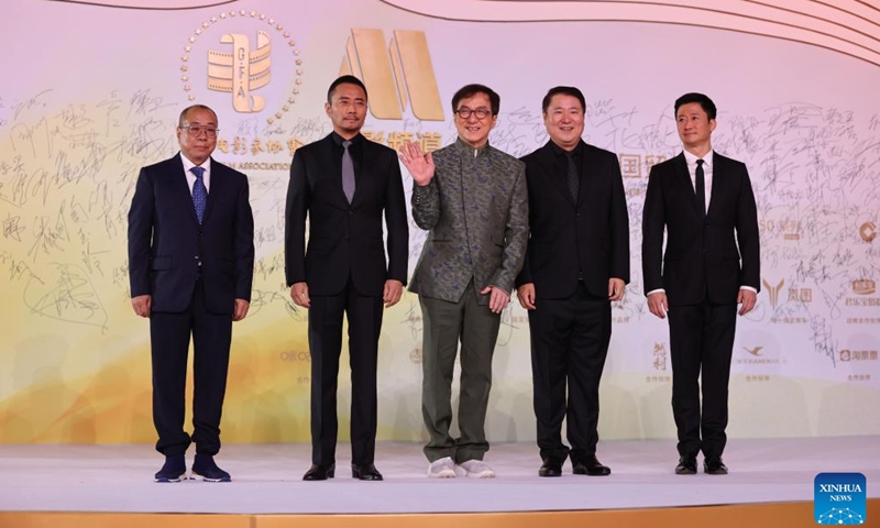 Actors Jackie Chan (C), Zhang Hanyu (2nd L) and Wu Jing (1st R) pose at the red carpet ceremony of the 2022 China Golden Rooster and Hundred Flowers Film Festival in Xiamen, southeast China's Fujian Province, Nov. 12, 2022.

The red carpet ceremony of the 2022 China Golden Rooster and Hundred Flowers Film Festival, featuring the 35th China Golden Rooster Awards, was held here on Saturday. (Photo by Zeng Demeng/Xinhua)