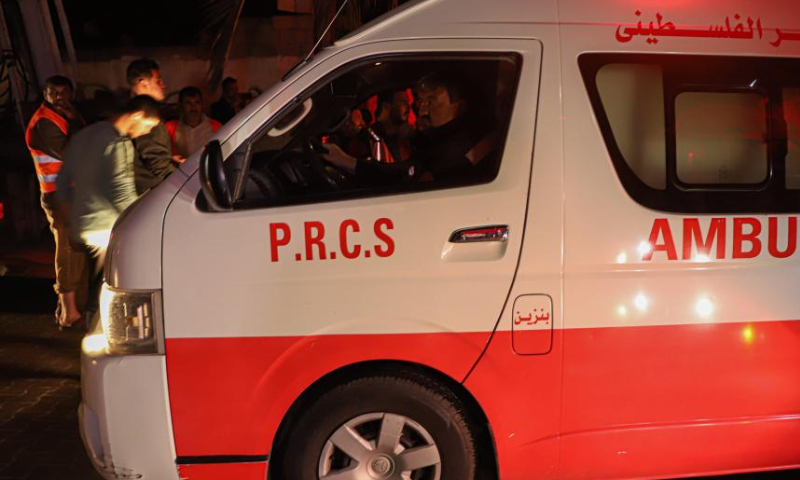 An ambulance is seen at the scene of a massive fire in Jabalia refugee camp in the northern Gaza Strip, on Nov. 17, 2022. At least 21 Palestinians, including seven children, were killed and more than 30 others were injured on Thursday in a massive fire inside a residential building in the northern Gaza Strip, said security and medical sources. Photo: Xinhua