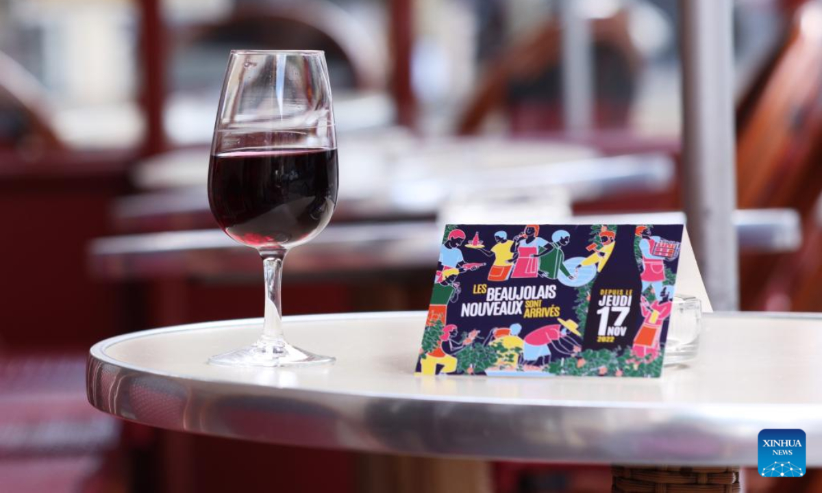 A glass of Beaujolais Nouveau wine is seen at a restaurant in Paris, France, Nov 17, 2022. The new Beaujolais Nouveau, a well-known French wine, was released on Thursday. Photo:Xinhua