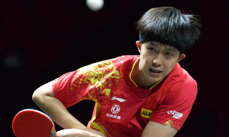 Wang Chuqin of China returns the ball during the men's singles first round match against Kirill Gerassimenko of Kazakhstan at the Asian Cup 2022 table tennis in Bangkok, Thailand, Nov. 17, 2022. Photo: Xinhua