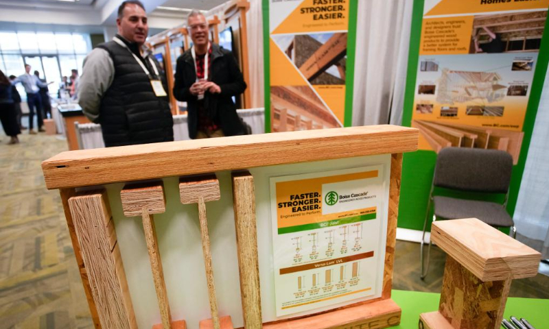 Engineered wood products are displayed at an exhibition hall during the Wood Solutions Conference in Vancouver, British Columbia, Canada, on Nov. 15, 2022. Photo: Xinhua