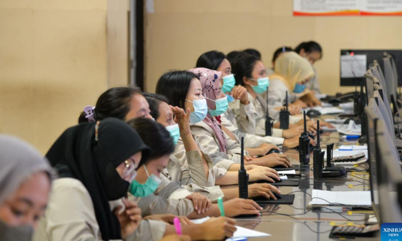 Workers work at a control room of ferronickel business unit in Weda Bay Industrial Park, North Maluku, Indonesia, Sept. 25, 2022. Photo: Xinhua