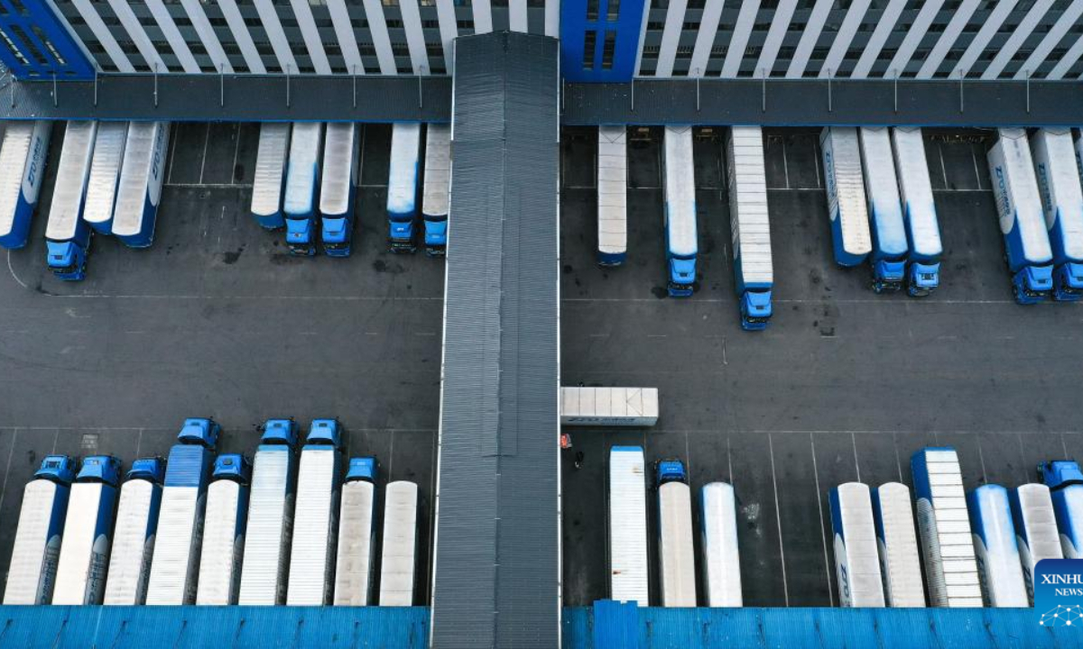 This aerial photo taken on Nov 10, 2022 shows trucks parking in a logistics park in Longli County, southwest China's Guizhou Province. Photo:Xinhua
