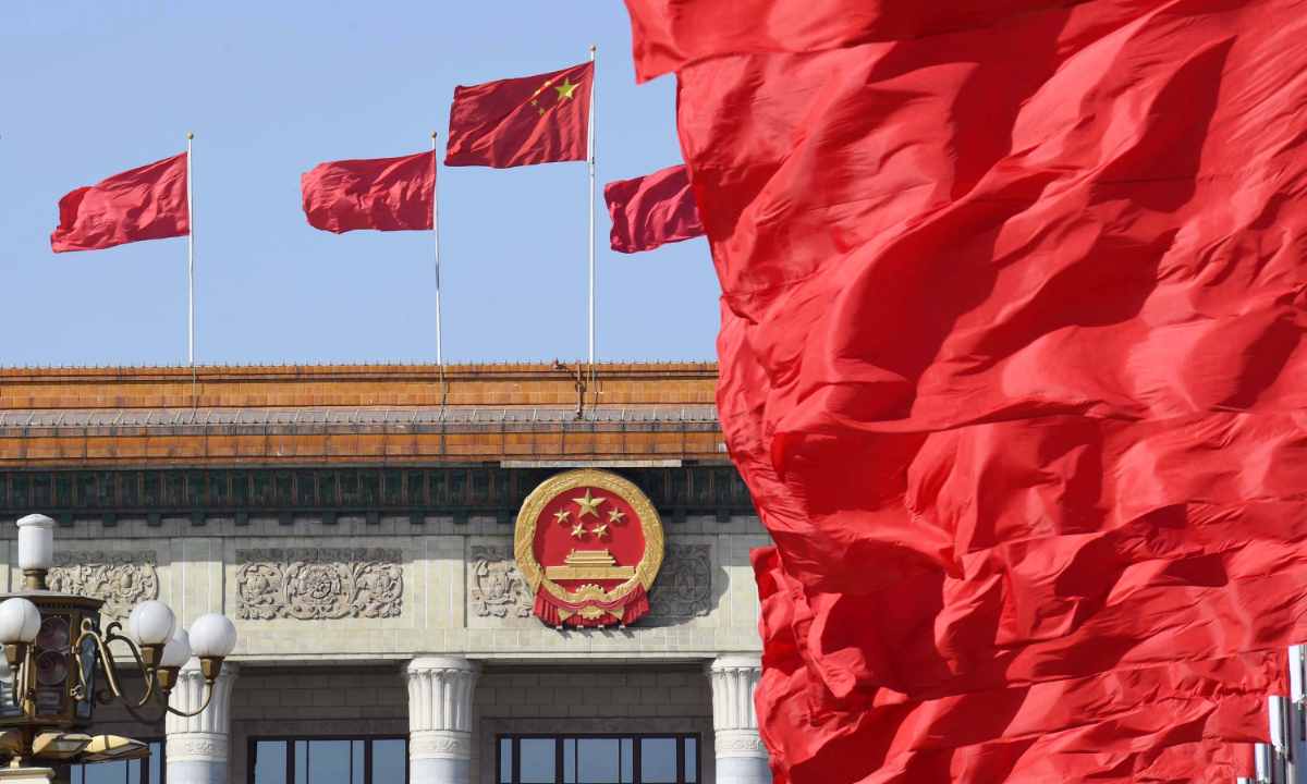 Flags are seen at the Tian'anmen Square and atop the Great Hall of the People during the opening meeting of the second session of the 13th National People's Congress in Beijing, capital of China, March 5, 2019. Photo:Xinhua