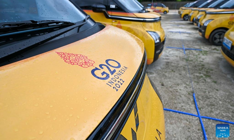 Wuling Air EVs are pictured at a service station in Bali, Indonesia, Nov. 13, 2022. These new energy vehicles, all provided by SAIC General Motors Wuling Motor Indonesia, are official vehicles for transit service to delegates and staff members of the 17th Group of 20 (G20) Summit being held in Bali. (Xinhua/Zulkarnain)