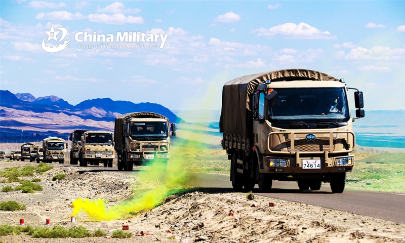 Military trucks attached to a PLA border defense regiment pass through a simulated chemical-weapon-struck area during a long-distance maneuver in a comprehensive exercise held on September 26, 2022. Photo: eng.chinamil.com.cn