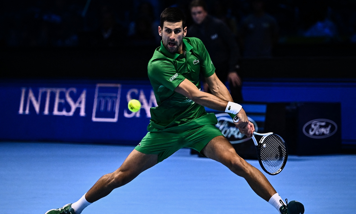 Novak Djokovic returns to Stefanos Tsitsipas at the ATP Finals tennis tournament in Turin, Italy on November 14, 2022. Photo: AFP