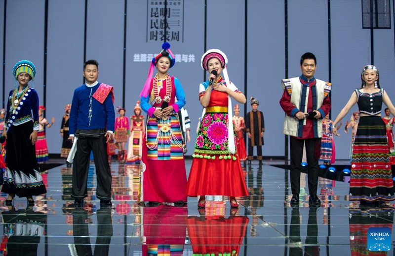 Entertainers perform during the opening ceremony of an ethnic clothing festival held in Kunming, southwest China's Yunnan Province, Nov. 15, 2022. Creations from different ethnic groups of Yunnan will be presented during the ethnic clothing festival. (Xinhua/Chen Xinbo)