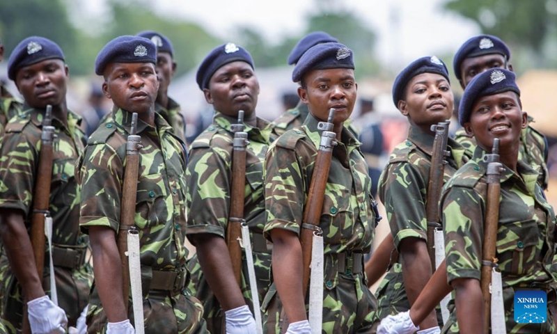 Police graduates parade during the graduation ceremony in Blantyre, Malawi, Nov. 15, 2022. More than 1,000 police graduates were commissioned to the Malawi police service on Tuesday, after completing their training in various police training colleges in the country. (Photo by Joseph Mizere/Xinhua)