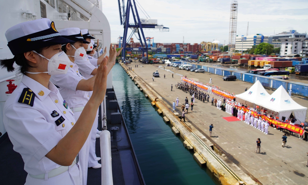 
Soldiers and officers on the Chinese PLA Navy's hospital ship Peace Ark wave goodbye to people seeing them off on November 18, 2022 at the port of Tanjung Priok in Jakarta, Indonesia, after finishing an eight-day visit on Mission Harmony-2022. Photo: Xinhua