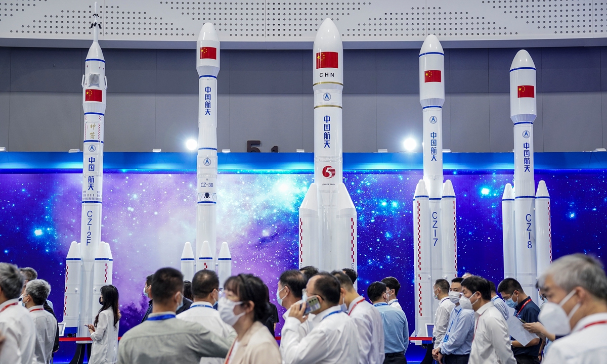 A series of Chinese carrier rockets of the Long March family are on display in Haikou, South China's Hainan Province, on November 21, 2022, as the 2022 China Space Conference opens, drawing crowds of visitors. Photo: VCG 