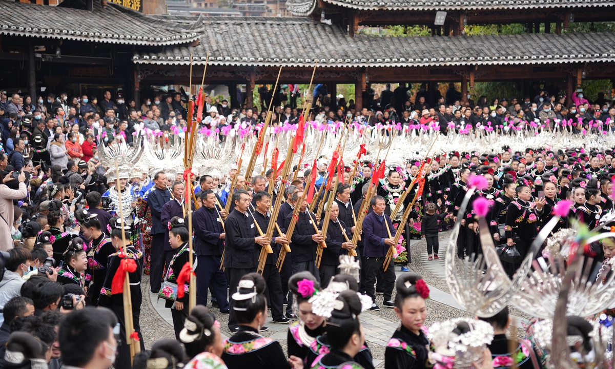 Photo released on November 22, 2022, shows members of the Miao ethnicity in Southwest China's Guizhou Province use traditional instruments and dances to celebrate their grandest festival for ancestor worship, the Guzang Festival, which is held once every 13 years. Photo: VCG