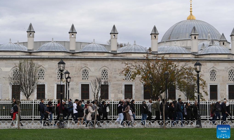 Tourists are seen near Sultanahmet Square in Istanbul, Türkiye, Nov. 23, 2022. More than 4.8 million foreign visitor arrivals were registered in Türkiye in October, up by 38.3 percent year on year, official statistics showed on Monday. (Xinhua/Shadati)